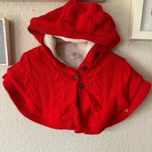 Red hooded sweater poncho